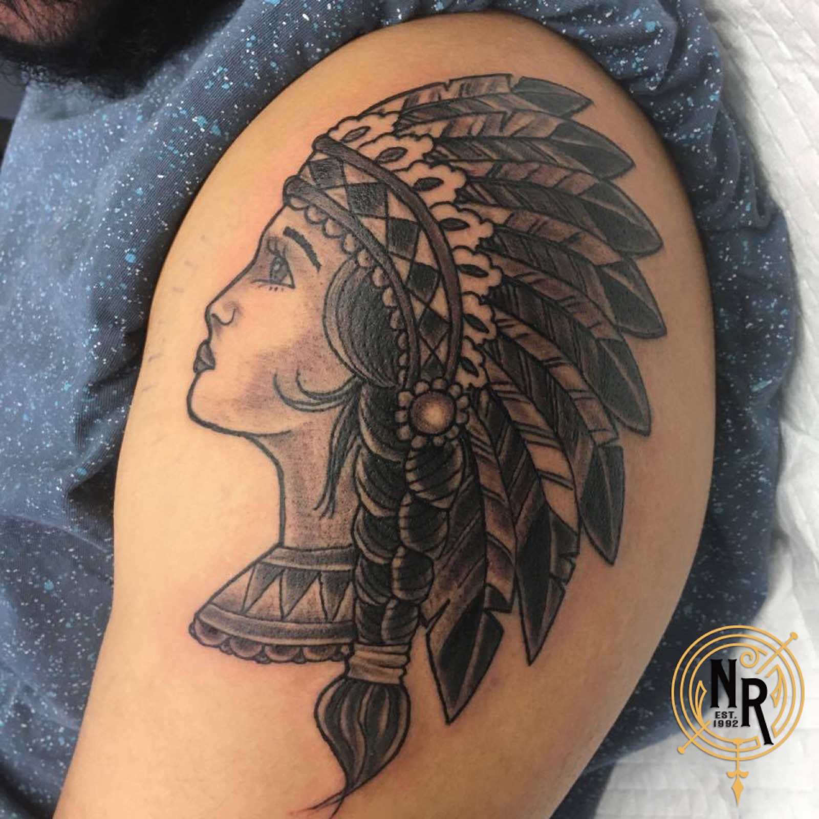 Native headdress portrait tattoo